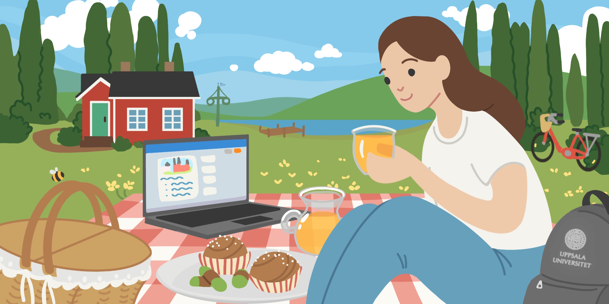 Kvinna som sitter ute och har picknick samtidigt som hon tittar på sin dator.